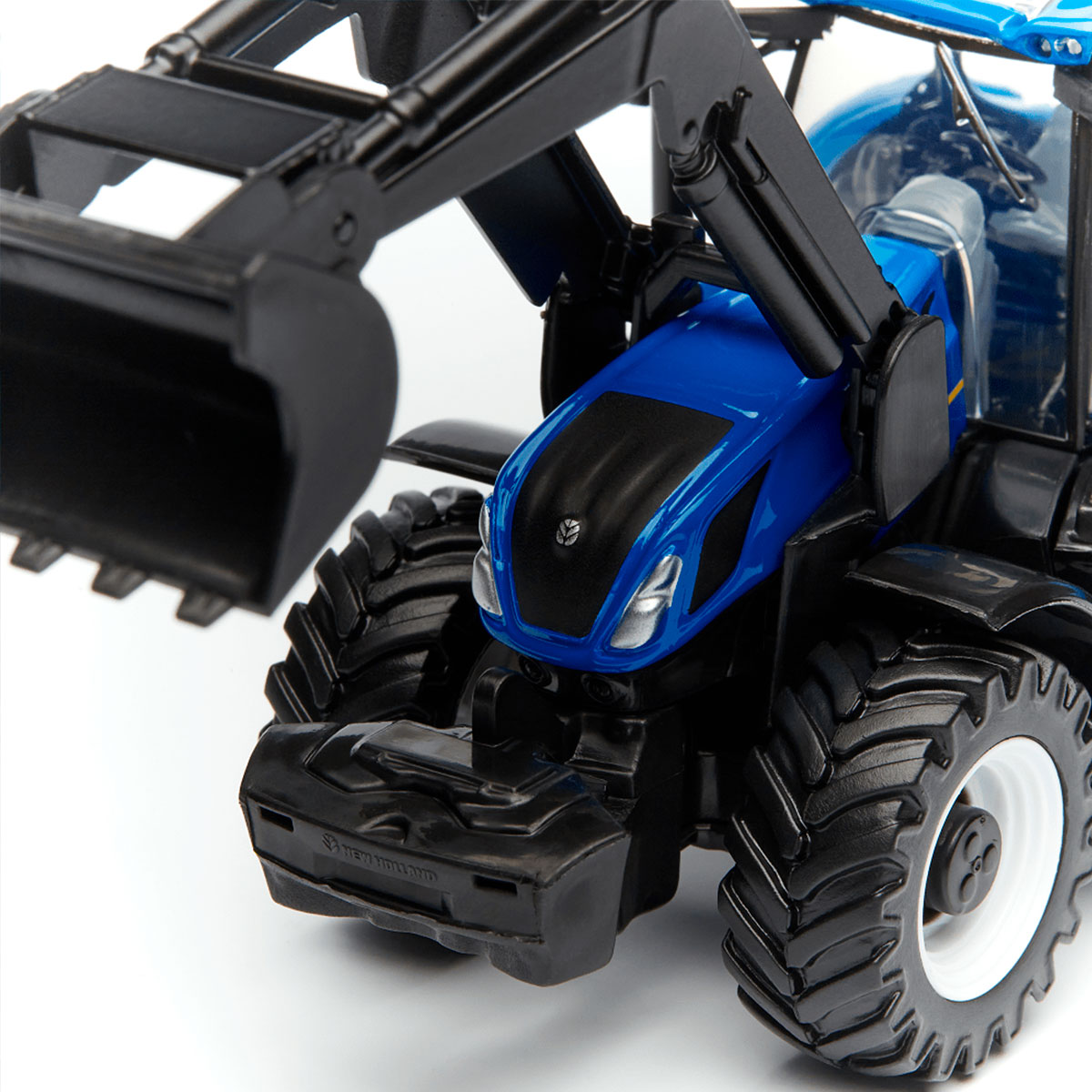 Модель серії Farm - Трактор NEW Holland T7.315 з фронтальним навантажувачем (синій, 1:32) — фото 2